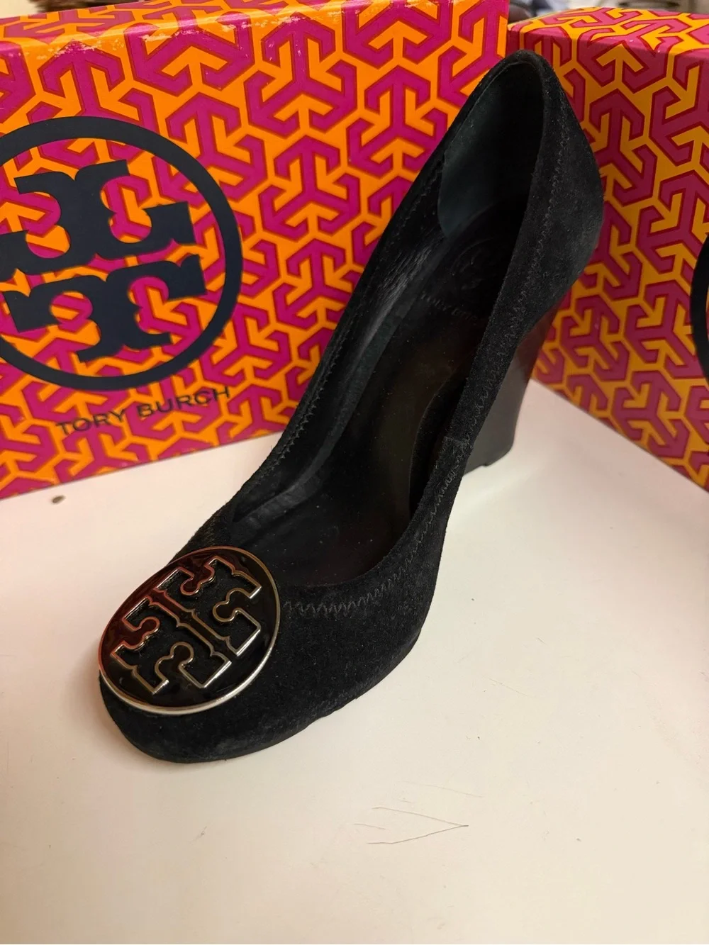 Tory Burch Black Suede Wedge Pumps with Gold Logo Medallion